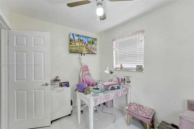 office featuring tile patterned flooring and ceiling fan