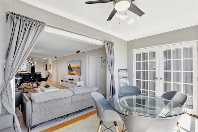 living area featuring light tile patterned floors, french doors, ornamental molding, and a ceiling fan