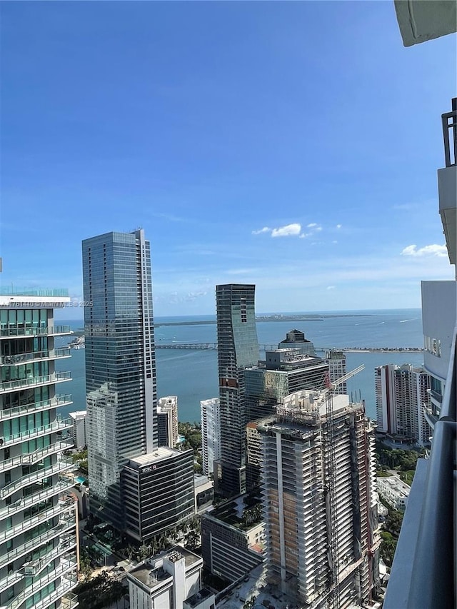 property's view of city featuring a water view