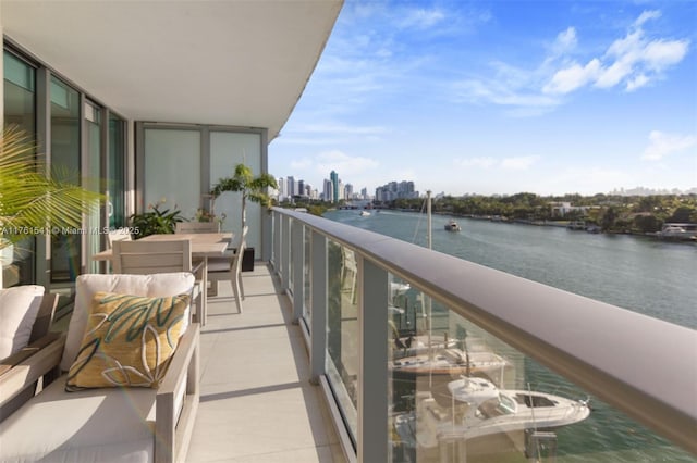 balcony with a city view and a water view