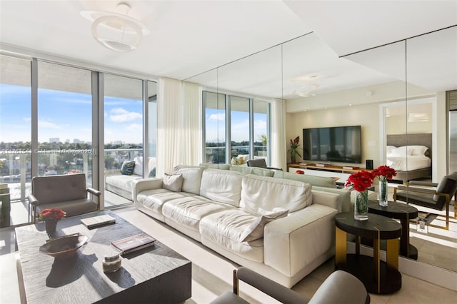 tiled living area featuring a city view and a wall of windows