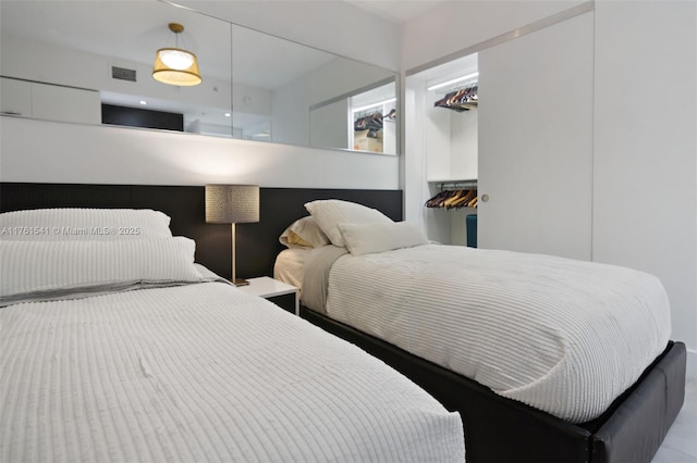 bedroom featuring visible vents