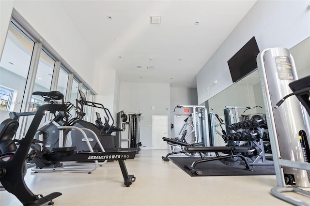 exercise room featuring visible vents