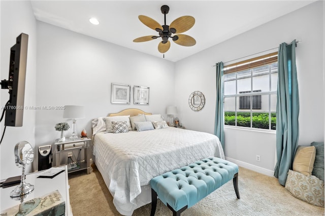 bedroom with light carpet, recessed lighting, a ceiling fan, and baseboards