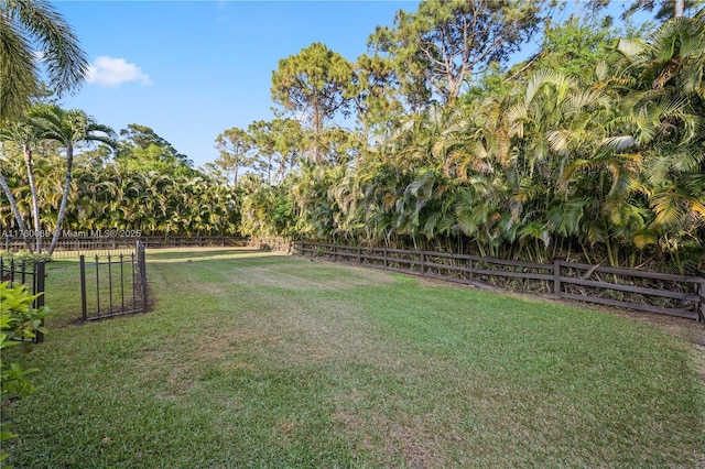 view of yard featuring fence