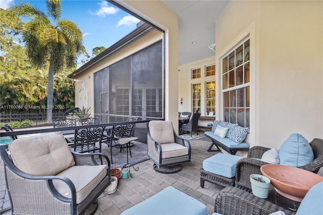 view of patio with outdoor dining space and an outdoor living space