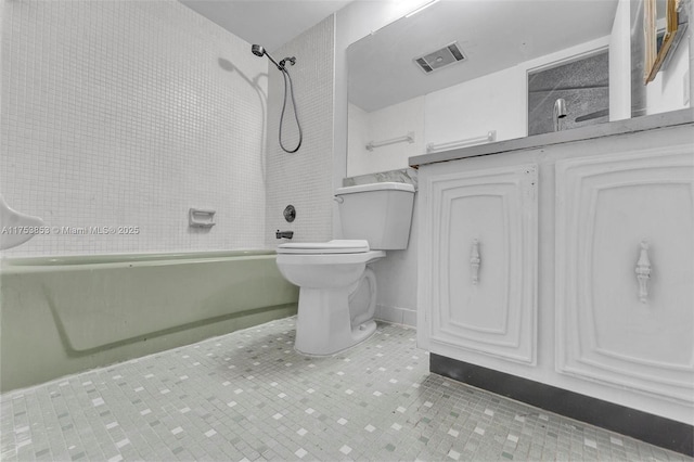 full bath featuring tile patterned flooring, visible vents, toilet, and shower / tub combination