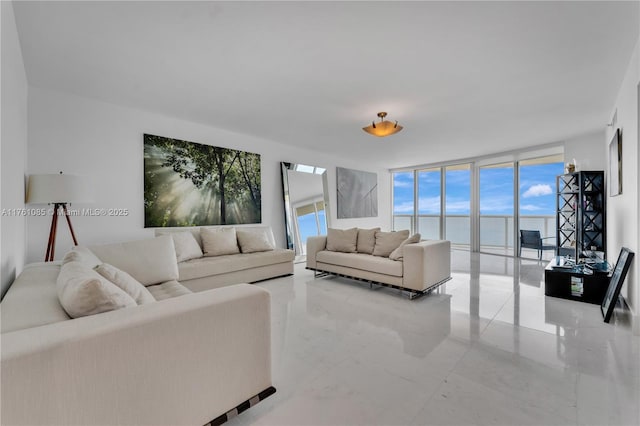 17201 Collins Ave Unit 3708, Sunny Isles Beach, FL 33160 - living room featuring floor to ceiling windows
