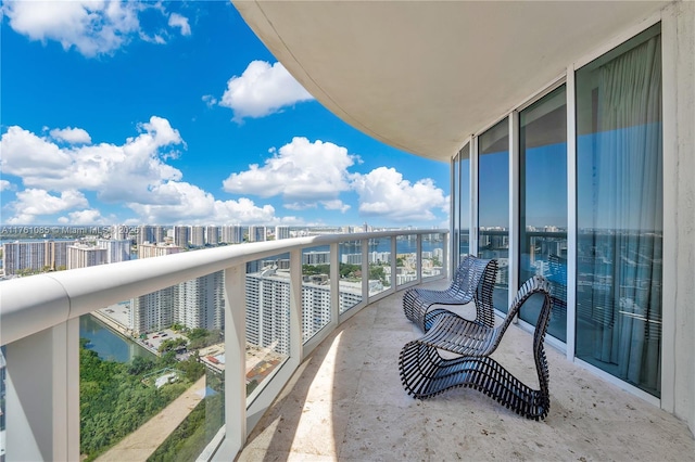 balcony featuring a view of city