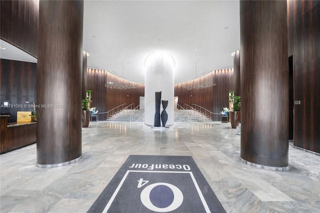 17201 Collins Ave Unit 3708, Sunny Isles Beach, FL 33160 - common area with a towering ceiling and stairs