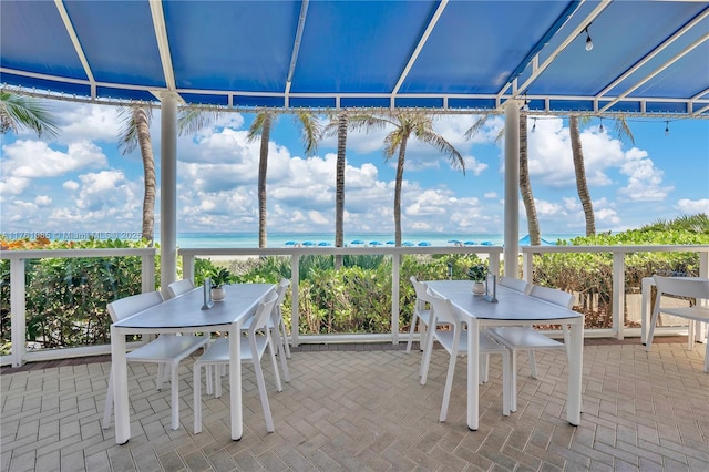 17201 Collins Ave Unit 3708, Sunny Isles Beach, FL 33160 - sunroom featuring view of water and beach