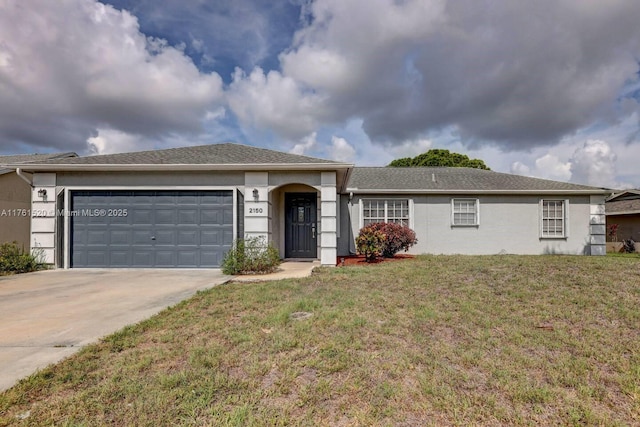 ranch-style house featuring a garage, concrete driveway, a front yard, and stucco siding