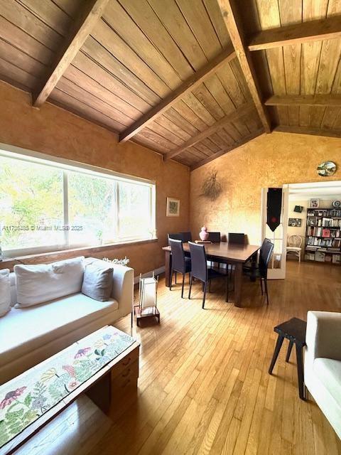1643 Nethia Dr, Miami, FL 33133 - living area with wood ceiling and hardwood / wood-style flooring