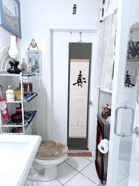 1643 Nethia Dr, Miami, FL 33133 - bathroom with tile patterned flooring