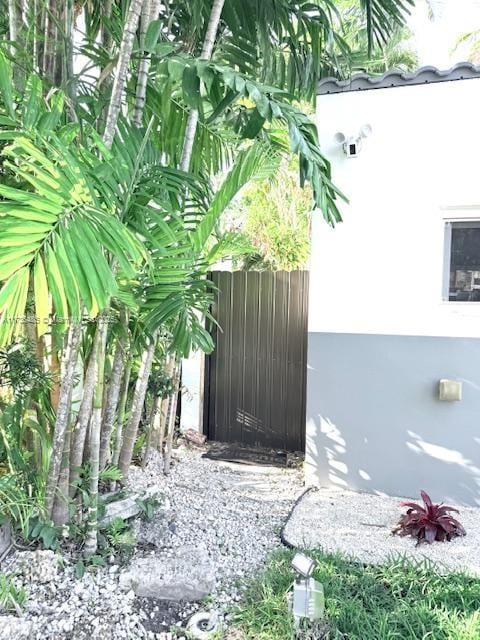 1643 Nethia Dr, Miami, FL 33133 - exterior space featuring a gate