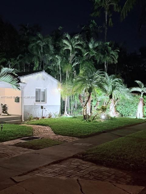 view of community featuring a yard