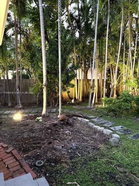 view of yard featuring fence