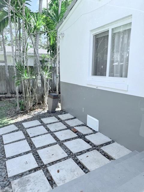 1643 Nethia Dr, Miami, FL 33133 - view of patio / terrace with fence