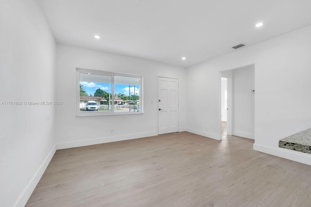 interior space with visible vents, recessed lighting, baseboards, and light wood-style floors