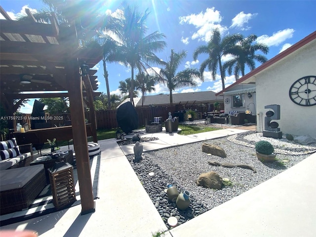 view of patio / terrace featuring an outdoor hangout area and a fenced backyard