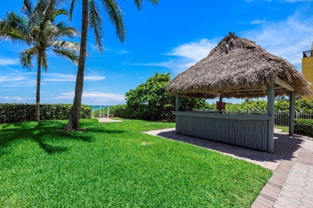 view of yard with a gazebo and fence