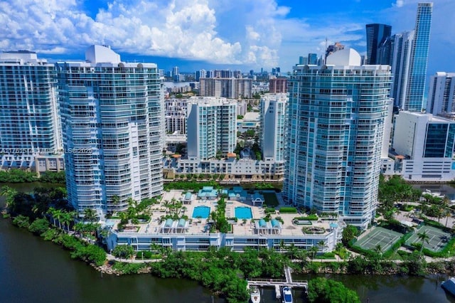 aerial view featuring a city view and a water view