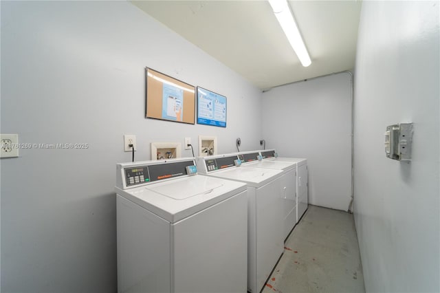 community laundry room with independent washer and dryer
