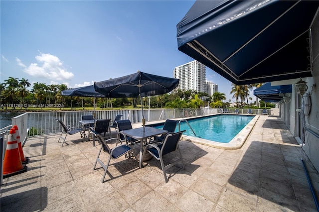 pool with a patio area