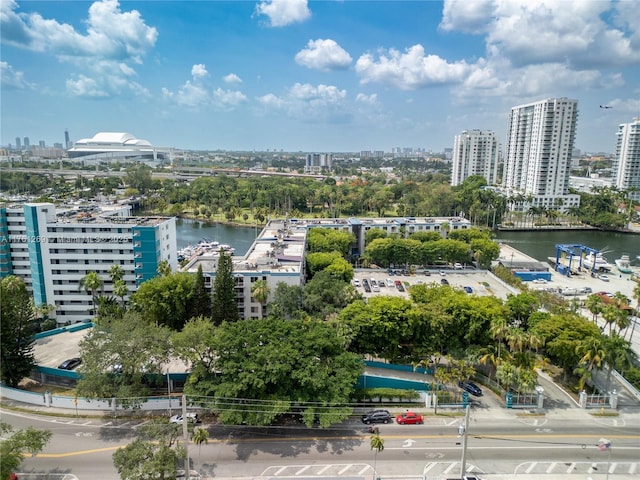 aerial view featuring a view of city and a water view