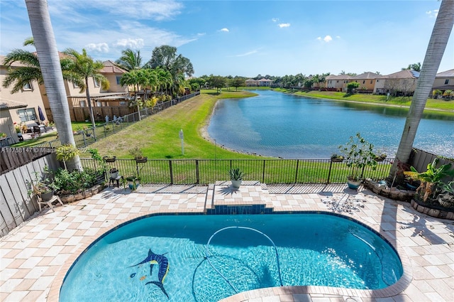 view of swimming pool featuring a patio, a fenced in pool, fence, and a water view