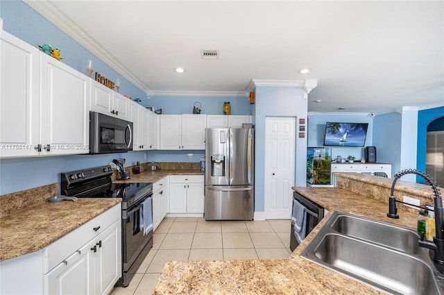 kitchen with a sink, black appliances, crown molding, and light tile patterned floors