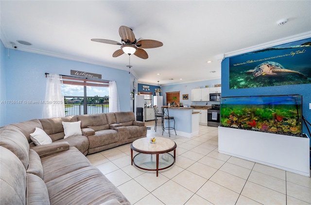 living area featuring light tile patterned flooring, recessed lighting, crown molding, and a ceiling fan