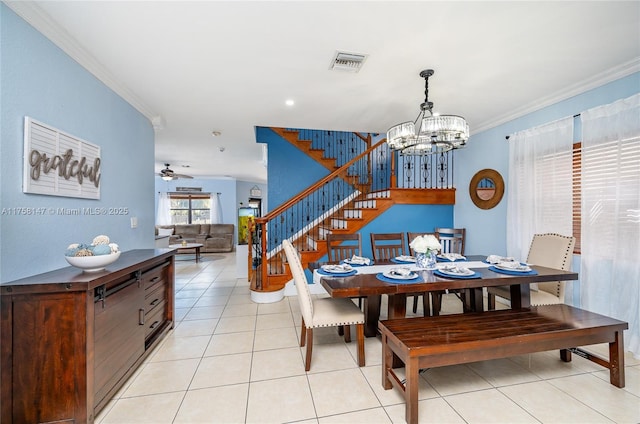 dining area with visible vents, ornamental molding, light tile patterned flooring, and stairway