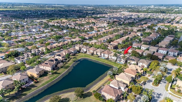 aerial view featuring a residential view and a water view