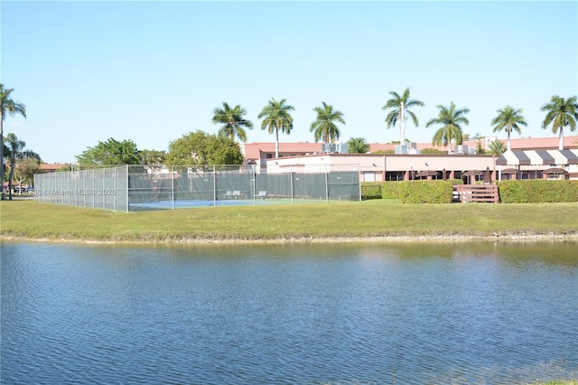 view of water feature featuring fence