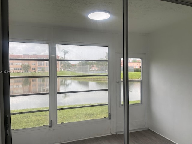 interior space featuring a water view