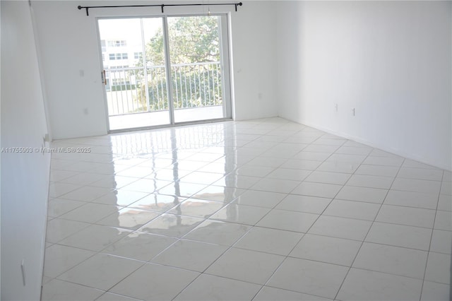 empty room featuring tile patterned flooring