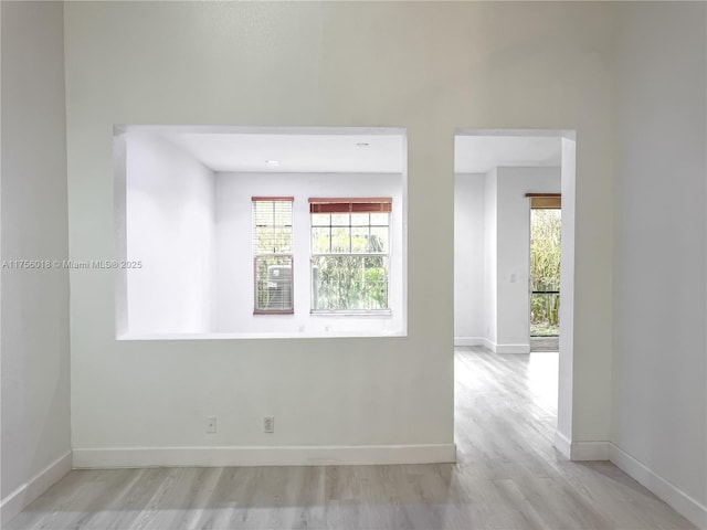 5737 NW 119th Dr Unit 5737, Coral Springs, FL 33076 - empty room with baseboards and wood finished floors