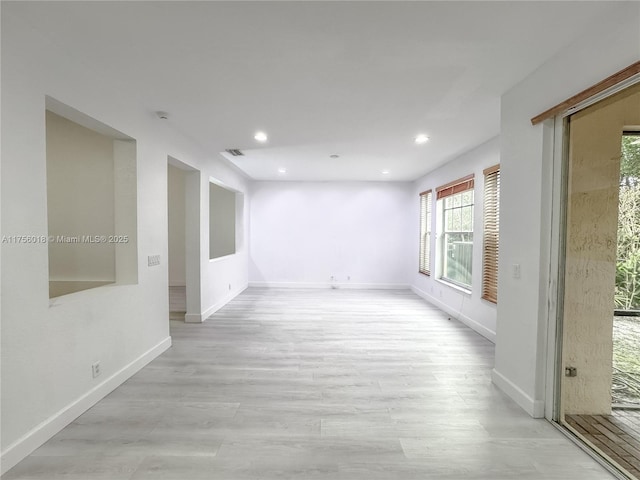 5737 NW 119th Dr Unit 5737, Coral Springs, FL 33076 - spare room with recessed lighting, baseboards, and light wood-style floors