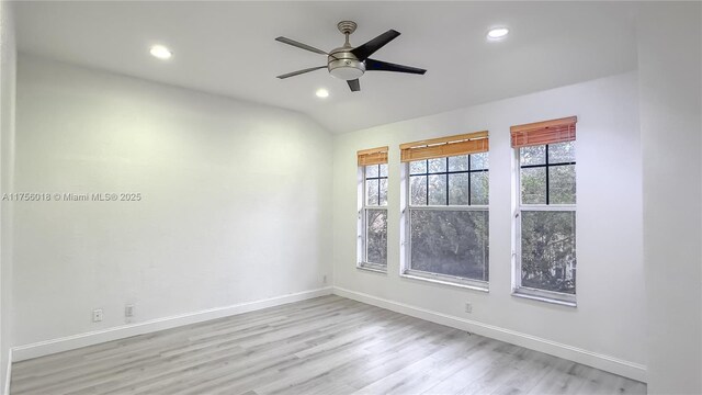 5737 NW 119th Dr Unit 5737, Coral Springs, FL 33076 - spare room featuring lofted ceiling, a ceiling fan, wood finished floors, recessed lighting, and baseboards