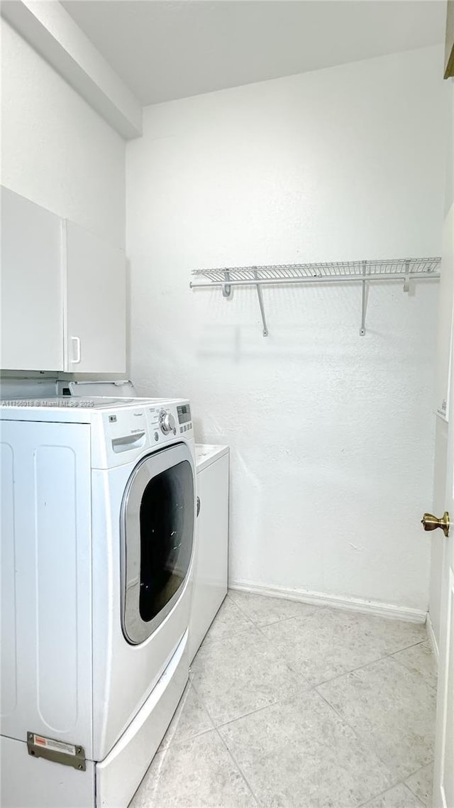 5737 NW 119th Dr Unit 5737, Coral Springs, FL 33076 - laundry room featuring laundry area and washing machine and clothes dryer