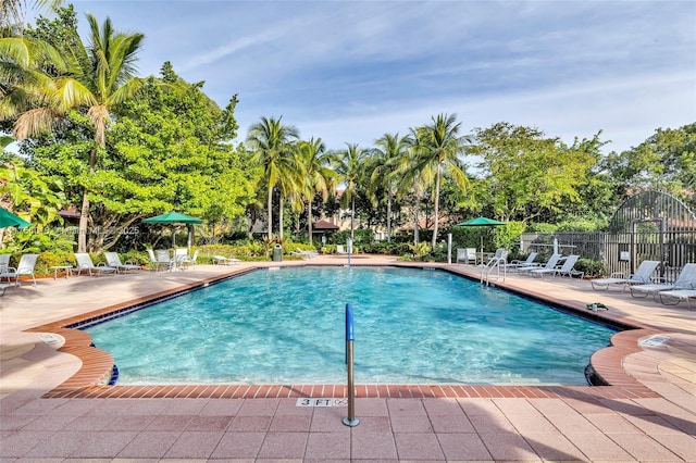 5737 NW 119th Dr Unit 5737, Coral Springs, FL 33076 - pool with a patio and fence