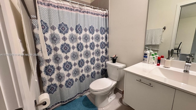 full bathroom with vanity, toilet, a shower with curtain, and tile patterned flooring