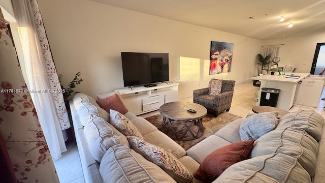 living room featuring light tile patterned floors