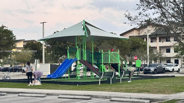 community playground with a lawn