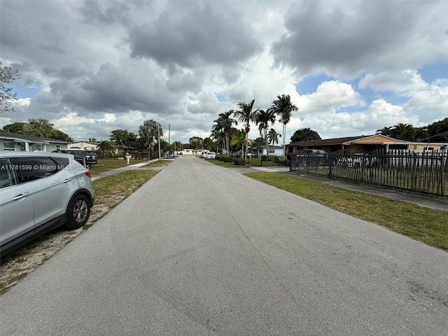 view of road with a residential view