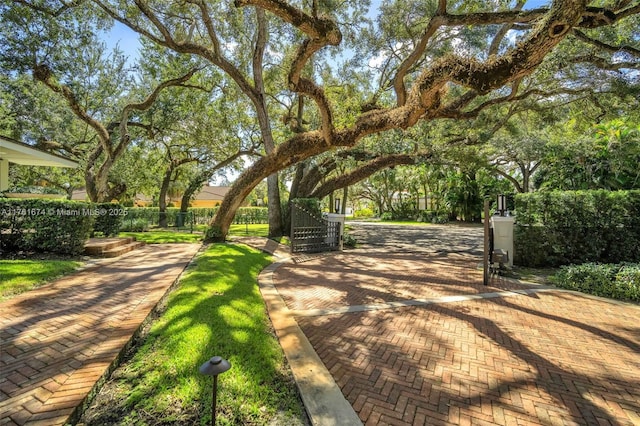 view of gate featuring fence