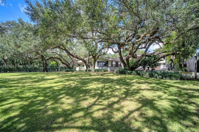 view of yard featuring fence