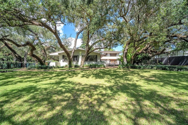 view of yard featuring fence