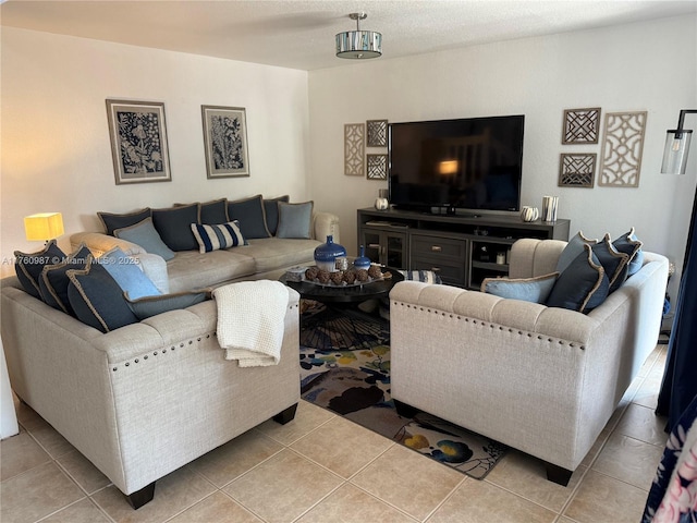 living room with tile patterned floors